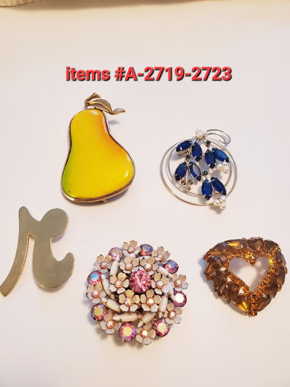 5 Brooches, items # A -2719-2723,. wt 105 grams.